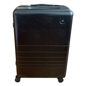 Monos Carry-on 23” Rolling Travel Luggage Black